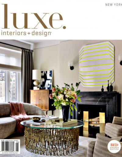 Elegant living room with contemporary design featured in luxe interiors + design magazine.